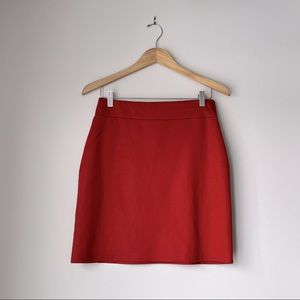 Rust color mini skirt